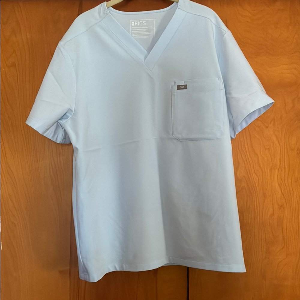 Figs Men's Sky Blue V-Neck Short Sleeve scrub top.